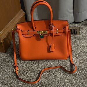 NWOT Elegant Orange Leather Handbag